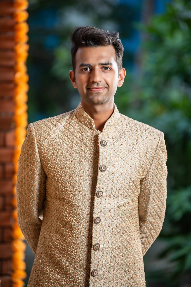 Ivory wedding sherwani tailored by Decent Tailor Ahmedabad